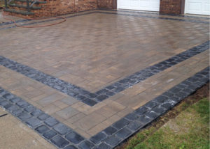 paver driveway installation with border in bergen county